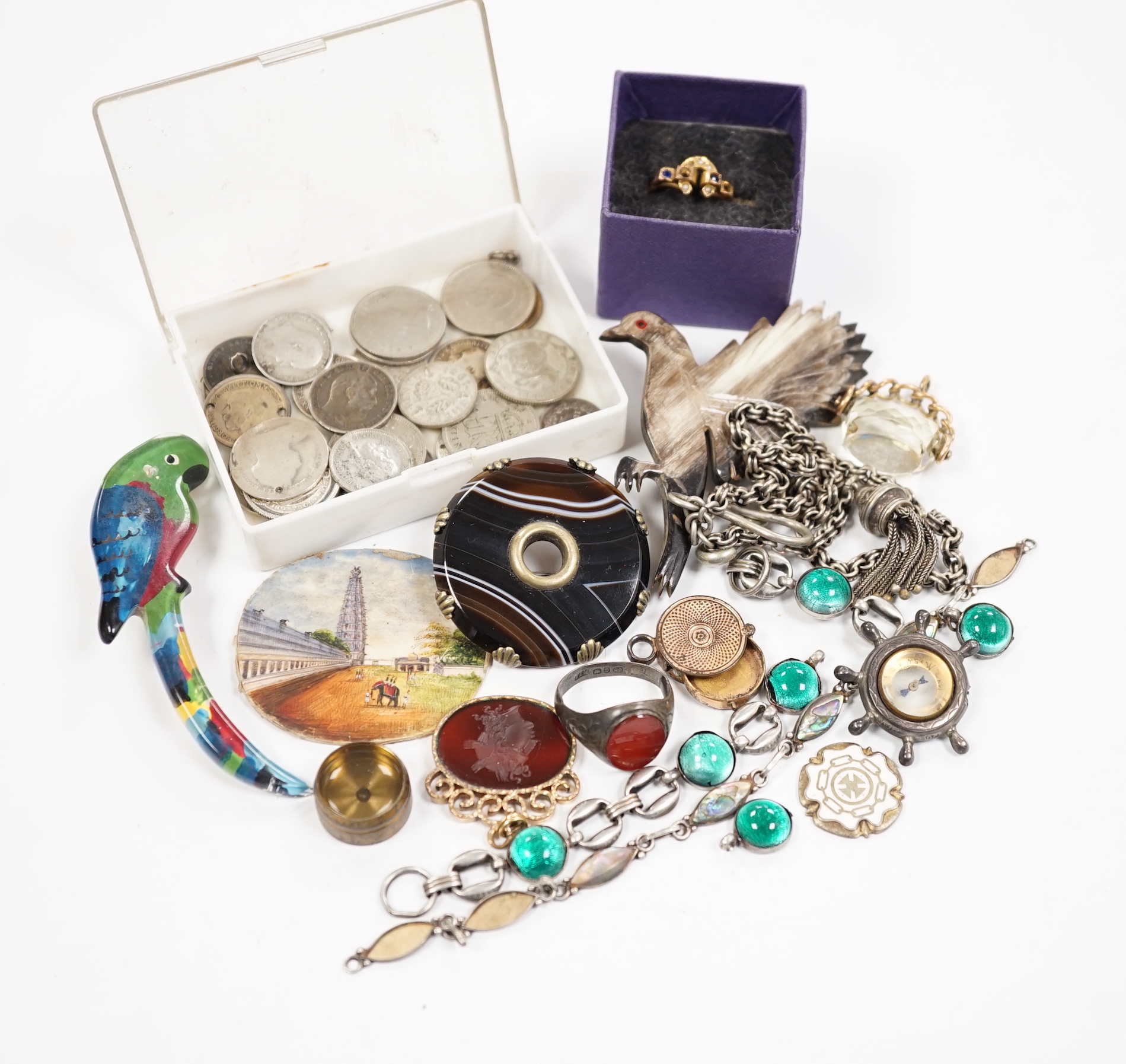 A small quantity of assorted jewellery including a late Victorian silver name brooch 'Polly', 42mm, a late Victorian 9ct gold and gem set horseshoe ring (stones missing), a late Victorian silver and carnelian set signet